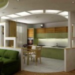 На снимката, комбинацията от кухнята и хола с помощта на цвят, и те са разделени от прегради