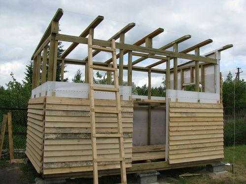 Frame shed sheathed with a board