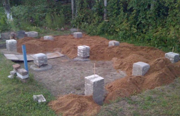 The foundation for a barn made of brick posts