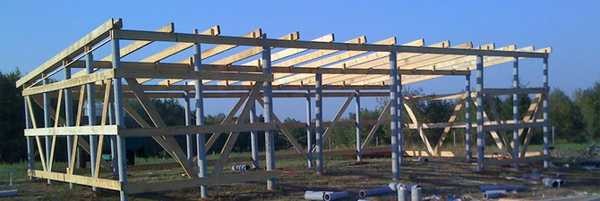A shed with wooden sheathing on a metal frame is built like this