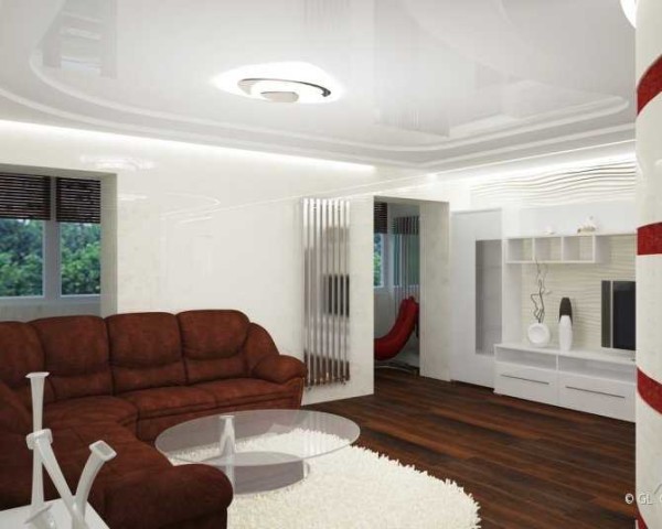 Vardagsrum. En stor halvcirkelformad soffa är mitten av interiören. Det upptar mitten av kompositionen