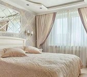 Класичне завесе у одговарајућем ентеријеру спаваће собе