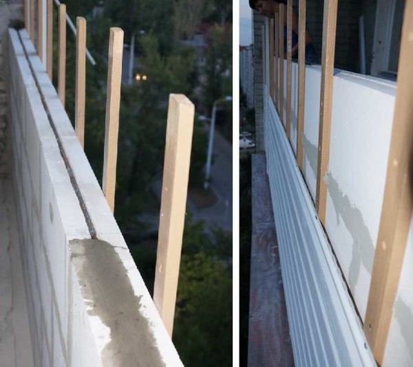Die Trennwand auf dem Balkon besteht aus Porenbetonsteinen. Die Verstärkung ist sichtbar (auf dem Foto links). Parallel dazu wurden außen Holzbretter montiert, an denen die Traurigkeit befestigt war