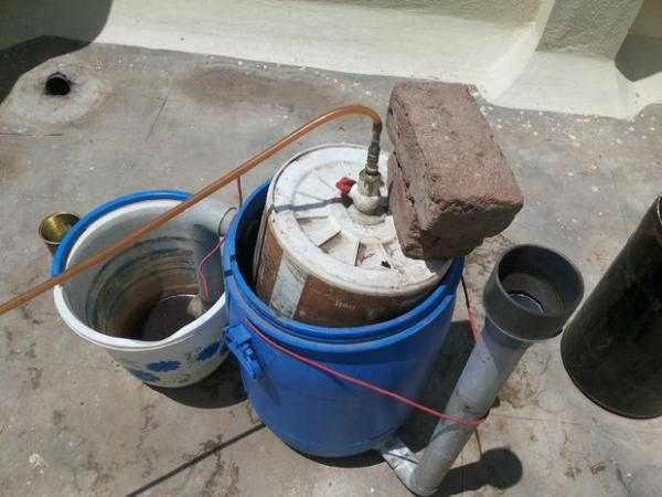 The simplest biogas plant from a plastic barrel