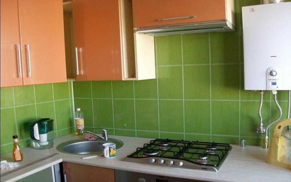 You can decorate the working wall in the kitchen with ceramic tiles.