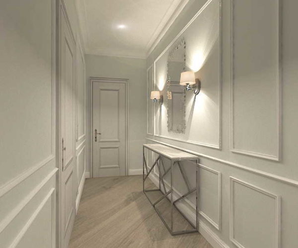 Dans un couloir long et étroit, les cadres élargissent visuellement l'espace